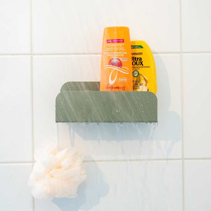 grande étagère de douche vert de gris pour cacher les produits dans la douche