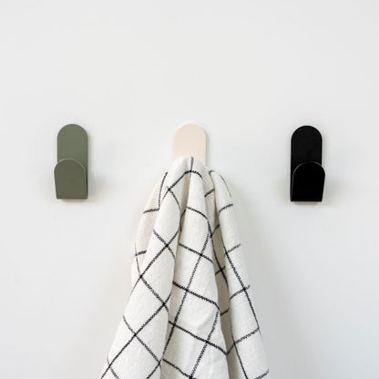 patère de cuisine fixer qui suspend un torchon