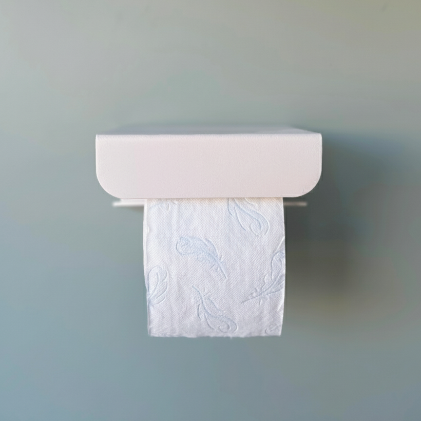 porte papier toilette crème fixé avec un rouleau de papier toilette 