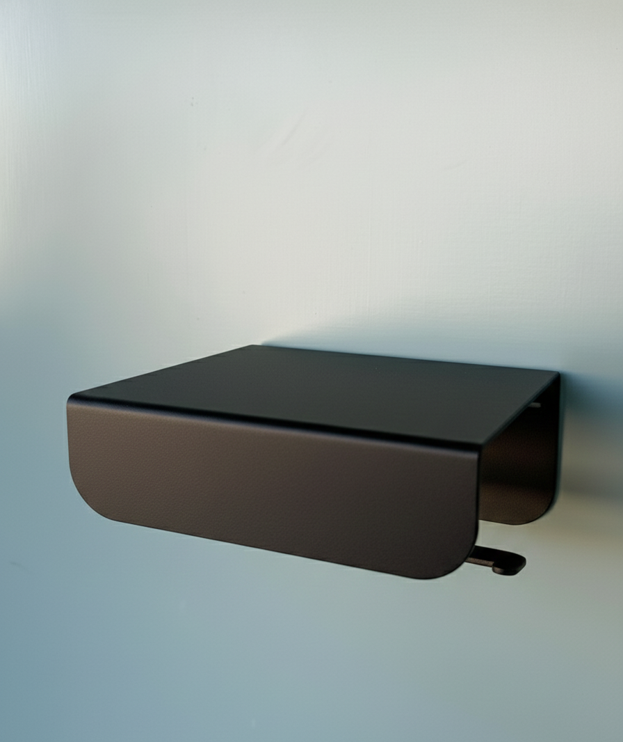 porte papier toilette noir avec un crochet pour maintenir le rouleau de papier toilette en place 